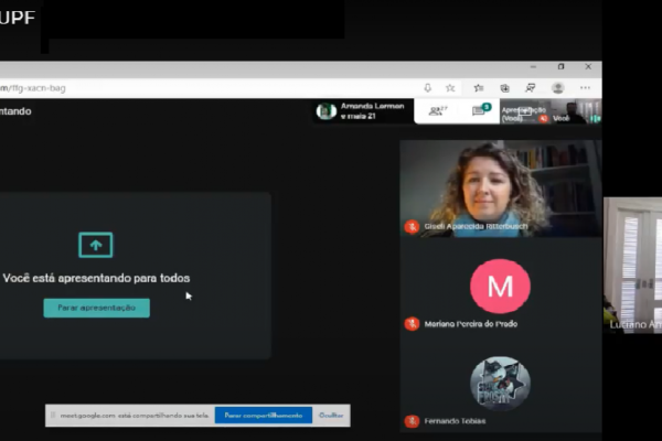 Médico veterinário Luciano Amaral com a professora Giseli em aula online